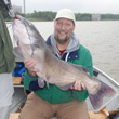 red river catfish guide with a good one